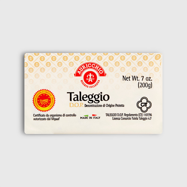 Taleggio cheese packaging label with brand logos and text on a light gray background