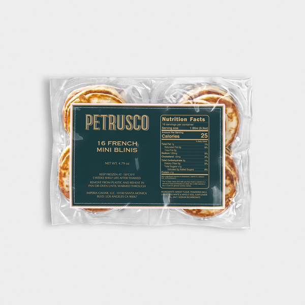 Packaged mini blinis with Petrusco branding on a white background