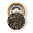 Load image into Gallery viewer, Open Petrusco Sevruga caviar tin showing small dark gray-green sturgeon pearls with branded lid
