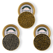 Load image into Gallery viewer, Three open gold tins of Petrusco caviar — golden-green Royal Ossetra, dark gray Sevruga, and olive-green River Beluga Hybrid — viewed from above.
