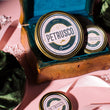 Load image into Gallery viewer, Petrusco Caviar displayed in wooden chest with amur and river beluga sturgeon roe sitting side-by-side
