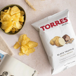 Load image into Gallery viewer, Torres black truffle potato chips with packaging on a light surface

