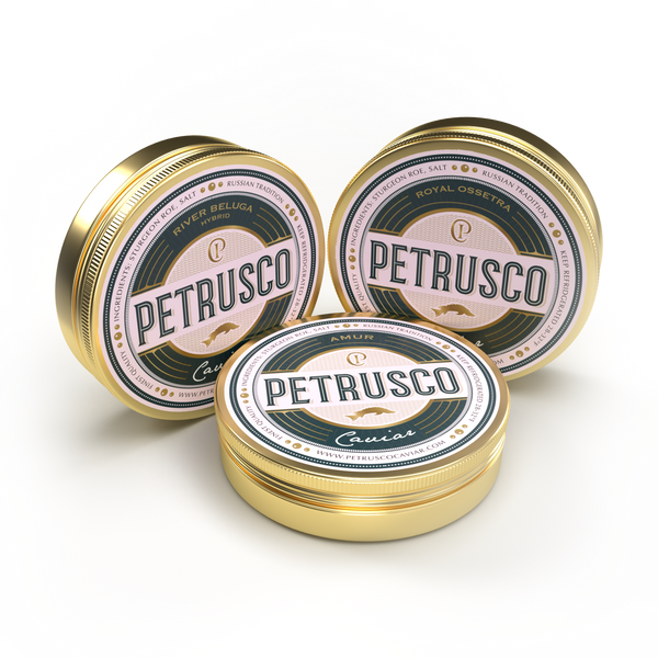 Closed tins of Royal Ossetra, River Beluga, and Amur caviar sit side by side.